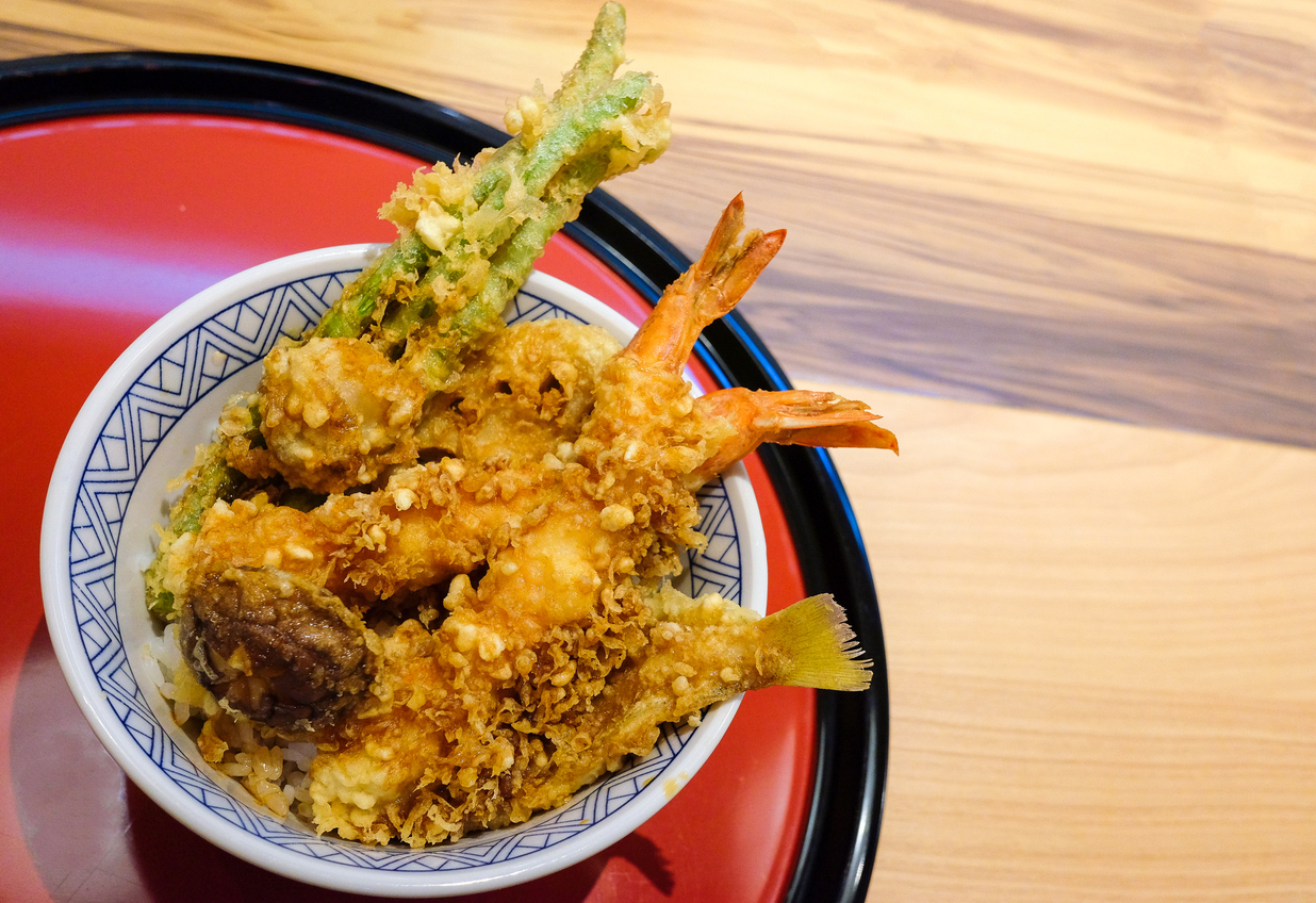 Tempura don or ten don japanese shrimp tempura on rice with sauce
